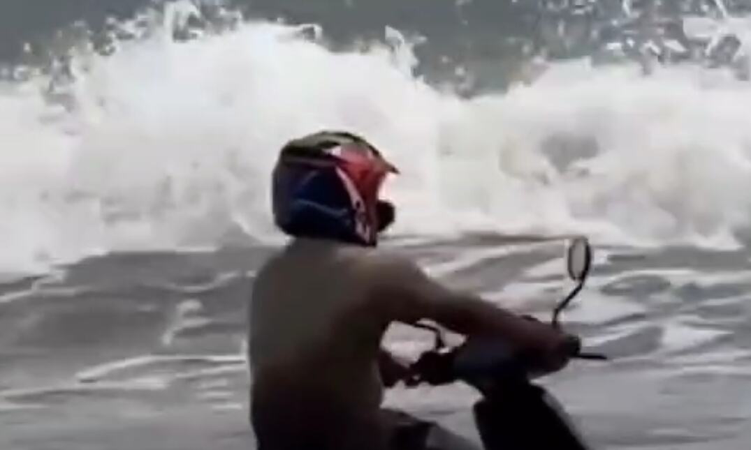 Man Rides Scooter into Sea, Becomes Internet Sensation