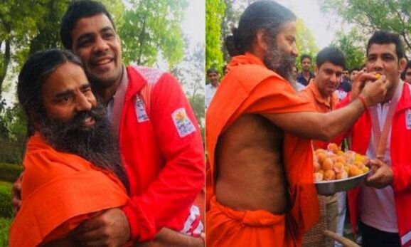 सोना जीत स्वदेश लौटे सुशील कुमार, सीधे रामदेव से मिलने पहुंचे