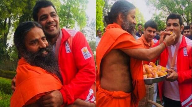 सोना जीत स्वदेश लौटे सुशील कुमार, सीधे रामदेव से मिलने पहुंचे